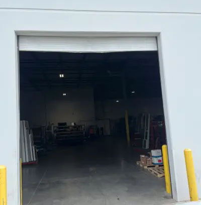 Before — Commercial Garage Door Section Replacement