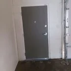After - Commercial Garage & Entry Door Replacement