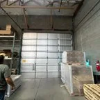 Before - Commercial Garage Door Springs and Rail Replacement for Manufacturing Facility