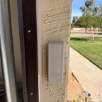 After - Sandpiper Residence Garage Door Replacement with Modern Contemporary Design