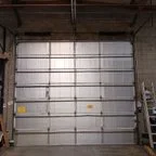 After - Commercial Garage Door Springs and Rail Replacement for Manufacturing Facility