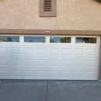 After - CHI Garage Door Replacement with Modern Almond Vinyl Trim