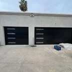 After - Commercial Garage Door Installation: Two Modern Steel Doors for Valwest Construction