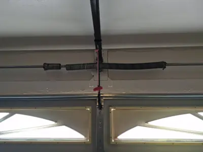 Garage Door Spring Repair & Operational Adjustment