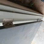 After - Commercial Garage Door General Service and Hinge Replacement