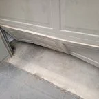 After - Garage Door Panel Repair and Maintenance for Apartment Complex