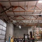After - Commercial Garage Door Springs and Rail Replacement for Manufacturing Facility
