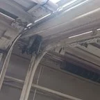 After - Commercial Garage Door Cable Repair for Tire Shop