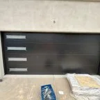 After - Commercial Garage Door Installation: Two Modern Steel Doors for Valwest Construction