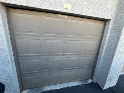 Garage Door Top Panel & Operator Repair for Apartment Complex
