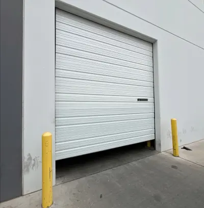 After — Commercial Garage Door Section Replacement