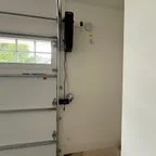 After - Multi-Door Garage Installation with Smart Openers for Commercial Building