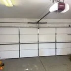 Before - 18x7 Garage Door Panel Replacement with Steel Flush Door