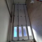 Before - Sandpiper Residence Garage Door Replacement with Modern Contemporary Design