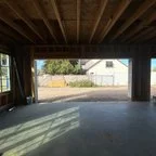 Before - Multi-Door Garage Installation with Smart Openers for Commercial Building