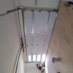 Before - Sandpiper Residence Garage Door Replacement with Modern Contemporary Design