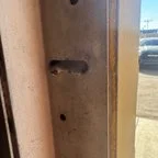 Before - Commercial Overhead Sectional Door Replacement for Auto Service Facility