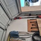 Before - Garage Door Rail Repair - Realignment and Maintenance