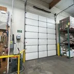 Before - Commercial Garage Door Springs and Rail Replacement for Manufacturing Facility