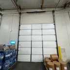 Before - Commercial Garage Door Springs and Rail Replacement for Manufacturing Facility