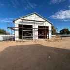 Before - Multi-Door Garage Installation with Smart Openers for Commercial Building